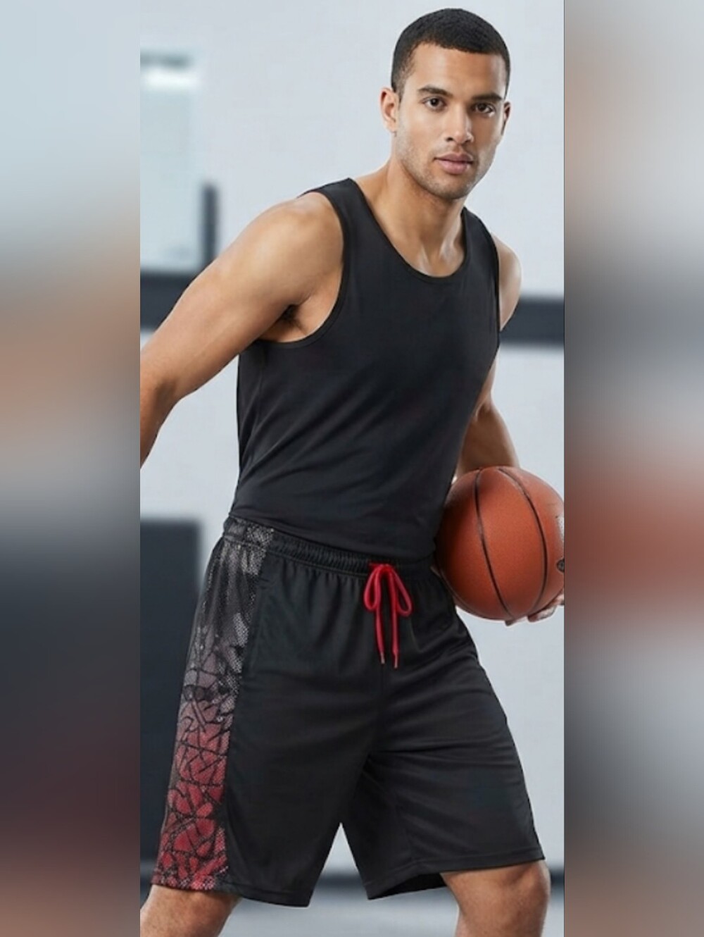 And1 Black Athletic Shorts with Red Geometric Panel